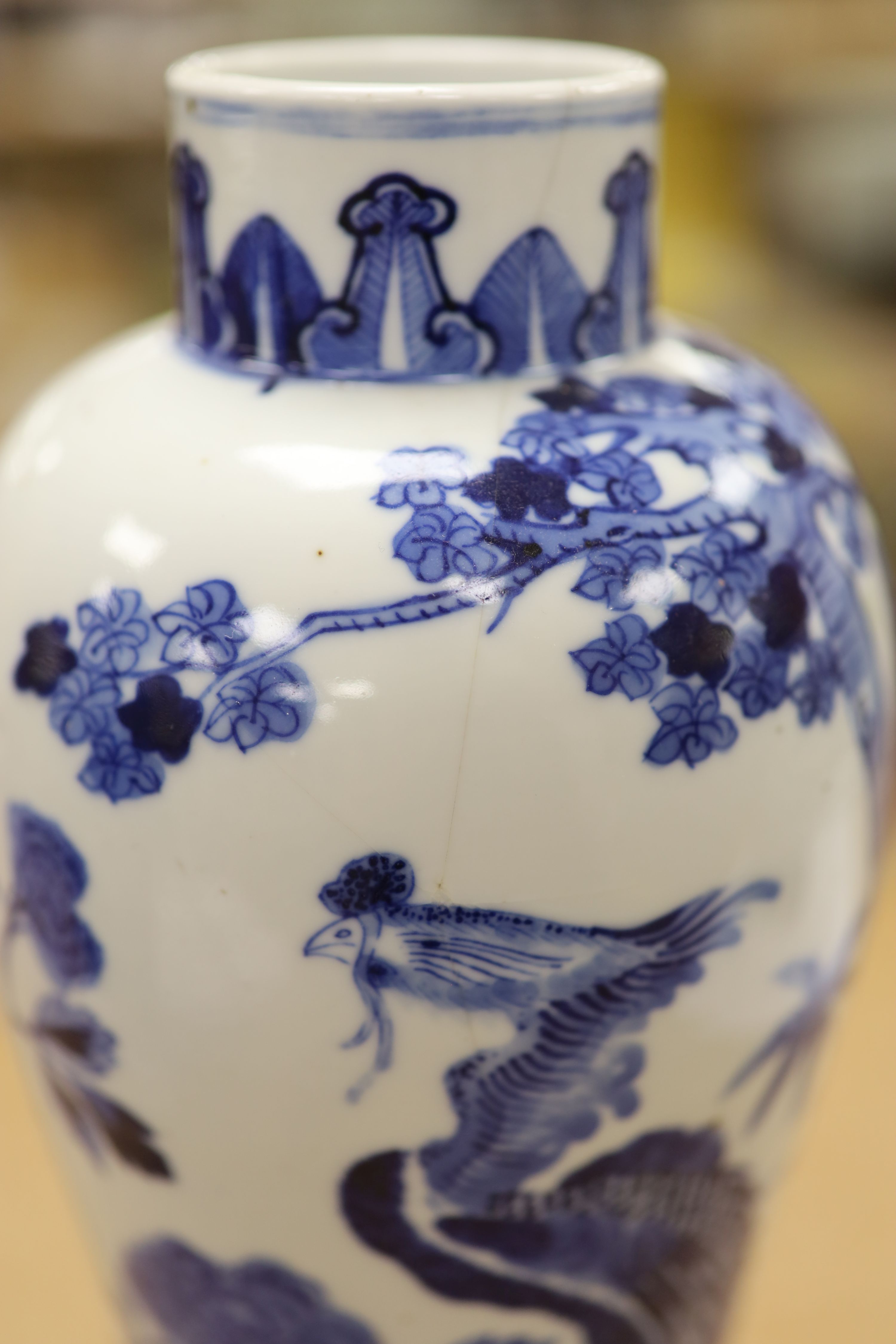 Two 19th century Chinese blue and white vases, decorated with phoenix, tallest 28cm (a.f)
